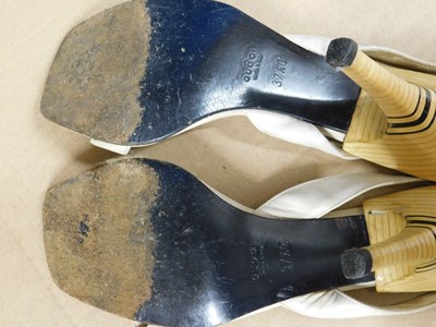 Lot 144 - Two pairs of Gucci shoes, to include a pair of...