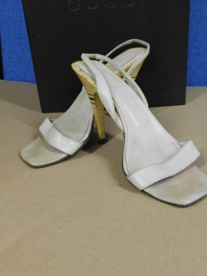Lot 144 - Two pairs of Gucci shoes, to include a pair of...