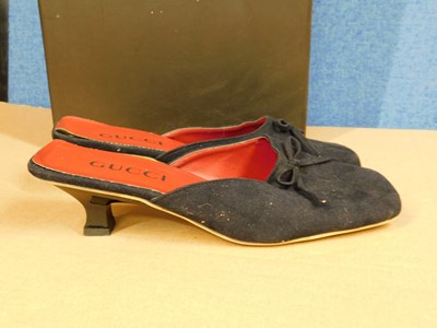 Lot 144 - Two pairs of Gucci shoes, to include a pair of...