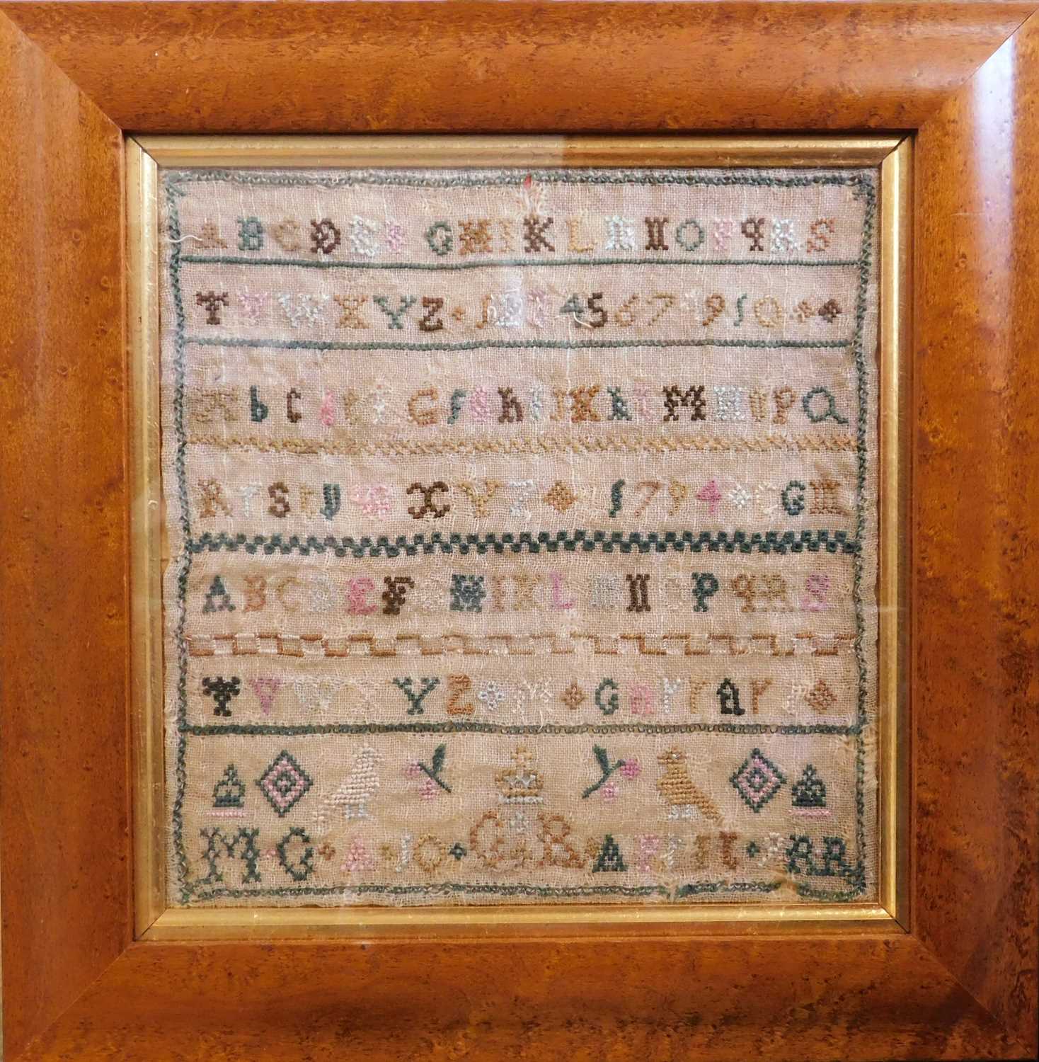 Lot 185 - A 19th century needlework sampler, with...