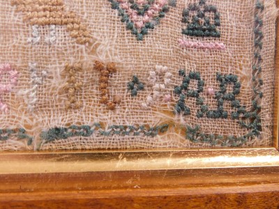 Lot 185 - A 19th century needlework sampler, with...
