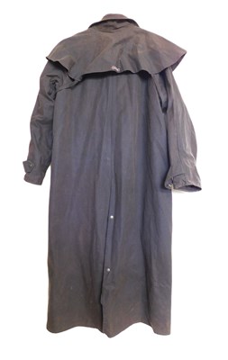 Lot 218 - A Driza-Bone 'Riding Coat', full length wax...