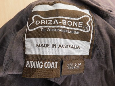 Lot 218 - A Driza-Bone 'Riding Coat', full length wax...