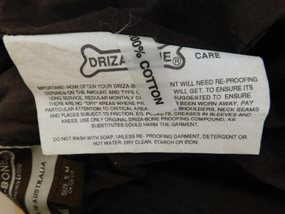 Lot 218 - A Driza-Bone 'Riding Coat', full length wax...