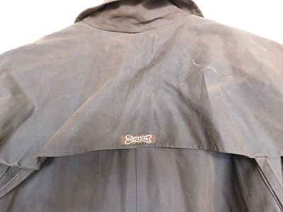 Lot 218 - A Driza-Bone 'Riding Coat', full length wax...