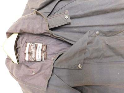Lot 218 - A Driza-Bone 'Riding Coat', full length wax...