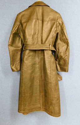 Lot 227 - A post WWII German dark green leather belted...