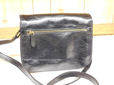 Lot 138 - A black leather cross body/shoulder bag by...