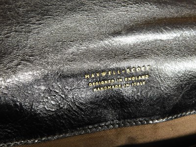 Lot 138 - A black leather cross body/shoulder bag by...