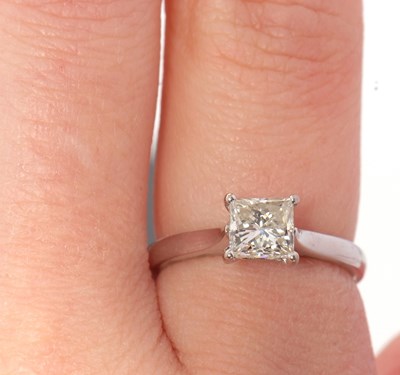 Lot 4 - An 18ct GIA certified diamond ring, the 1ct...