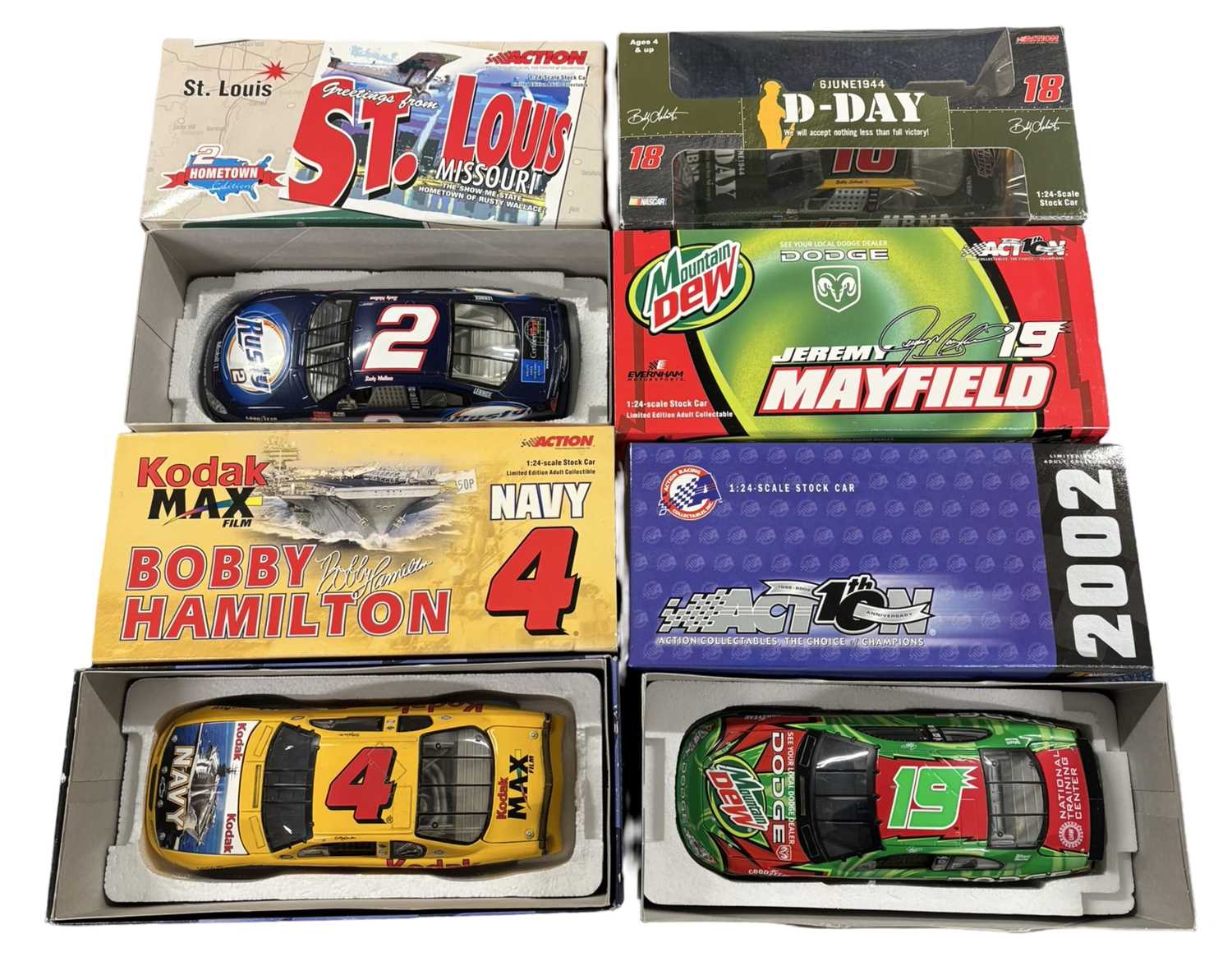 Lot 91 - Four boxed 1:24 scale NASCAR models, to...