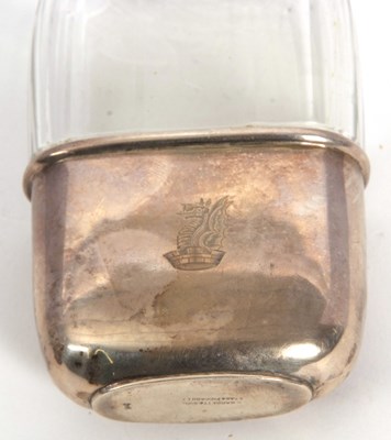 Lot 17 - A silver and glass spirit hip flask and cup of...