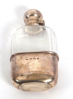 Lot 17 - A silver and glass spirit hip flask and cup of...
