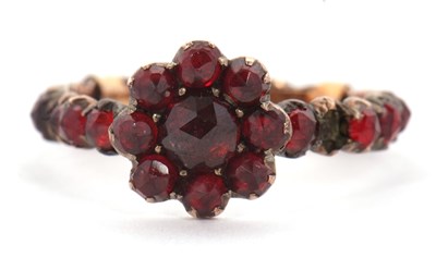 Lot 22 - A garnet ring, with garnet cluster to centre...