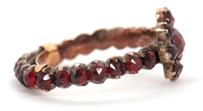 Lot 22 - A garnet ring, with garnet cluster to centre...