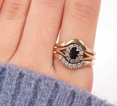 Lot 9 - A set of three 9ct rings, to include a...