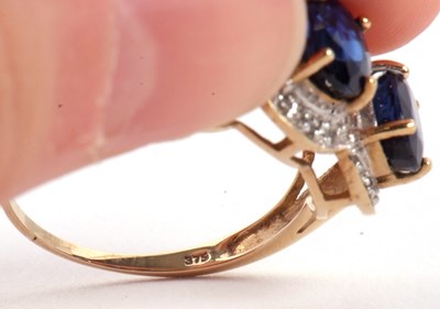 Lot 60 - A 9ct sapphire and diamond ring, the three...