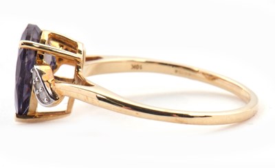 Lot 68 - A 9ct iolite and diamond ring, the pear shaped...