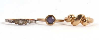 Lot 56 - Three rings: to include a 9ct crossover style...