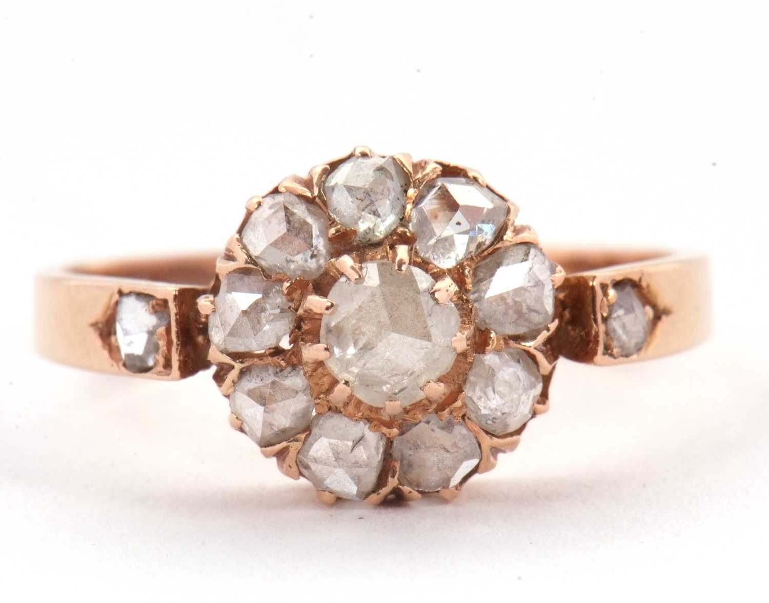 Lot 43 - A diamond cluster ring, set with rose cut...