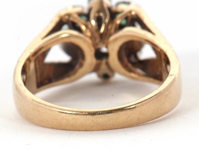 Lot 8 - A 9ct emerald and diamond cluster ring, the...