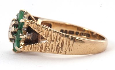 Lot 8 - A 9ct emerald and diamond cluster ring, the...