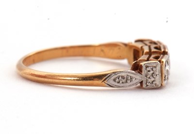 Lot 17 - A three stone diamond ring, the three slightly...
