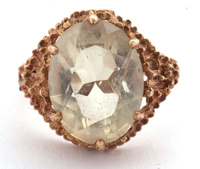 Lot 30 - A 9ct citrine ring, the oval citrine with...