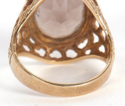 Lot 51 - A 9ct smokey quartz ring, the oval smokey...