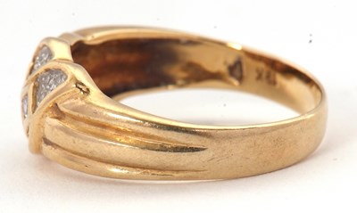 Lot 59 - A diamond ring, set with small round diamonds...