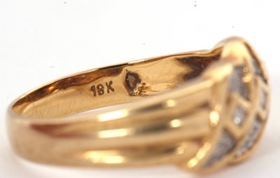 Lot 59 - A diamond ring, set with small round diamonds...