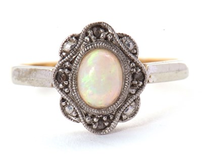 Lot 43 - An early 20th century opal ring, set with an...