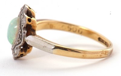 Lot 43 - An early 20th century opal ring, set with an...