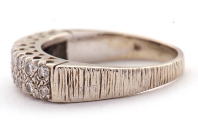 Lot 77 - An 18ct diamond ring, set with two rows of...