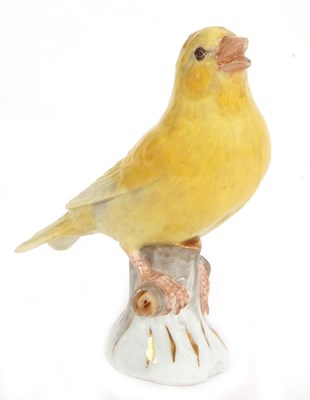 Lot 20 - A Meissen model of a canary perched on a tree...