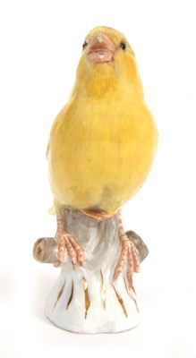 Lot 20 - A Meissen model of a canary perched on a tree...