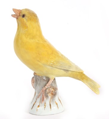 Lot 20 - A Meissen model of a canary perched on a tree...