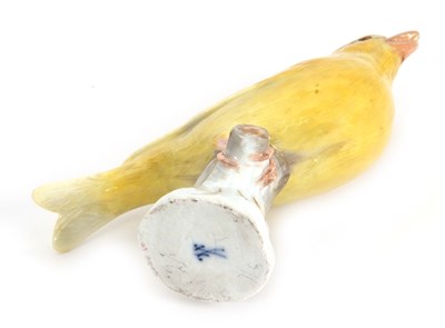 Lot 20 - A Meissen model of a canary perched on a tree...