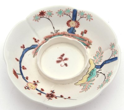 Lot 41 - A continental porcelain Trembleuse cup and...