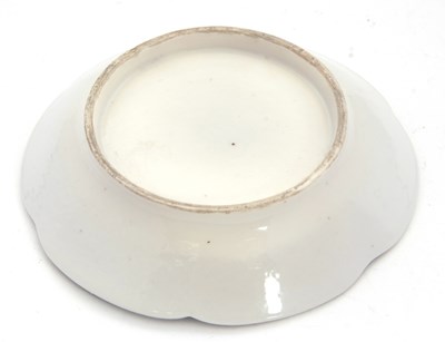 Lot 41 - A continental porcelain Trembleuse cup and...