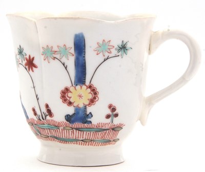 Lot 41 - A continental porcelain Trembleuse cup and...
