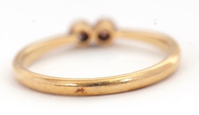 Lot 59 - A two stone diamond ring, set with two old...