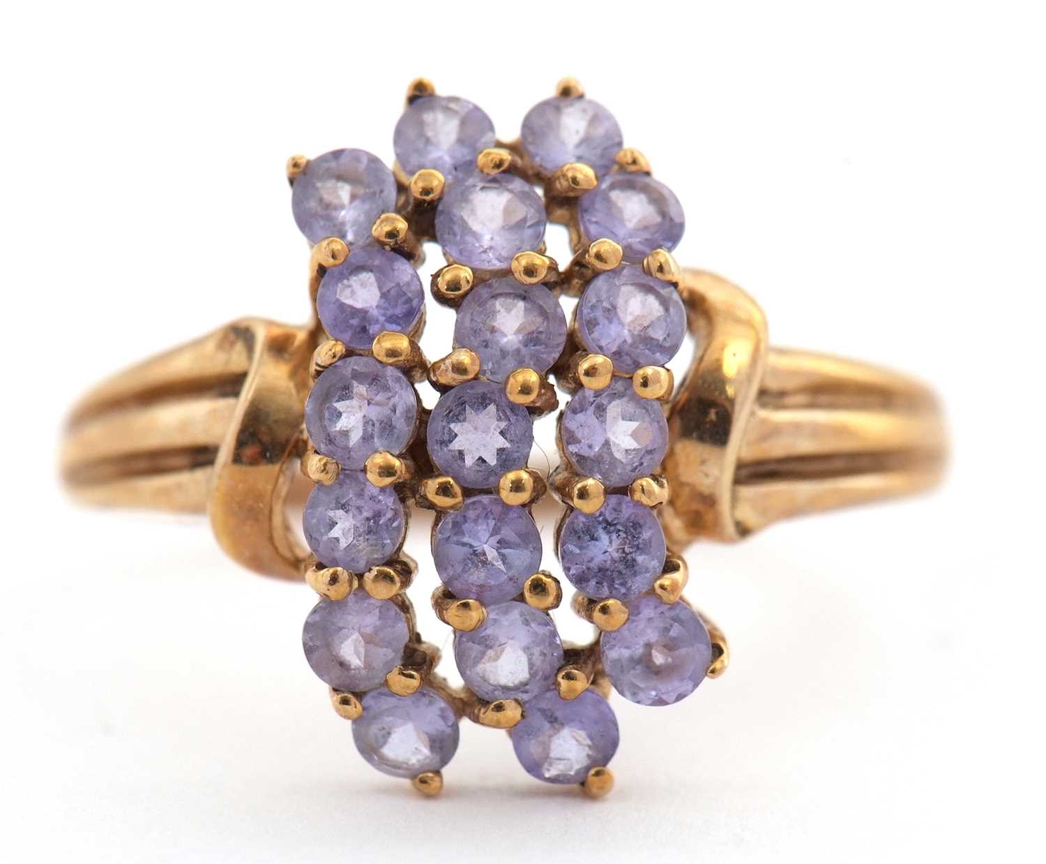 Lot 20 - A 9ct tanzanite ring, set with three rows of...