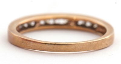 Lot 18 - A 9ct diamond half eternity ring, with channel...