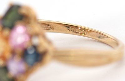 Lot 21 - A 9ct multi gemset ring, set with oval...