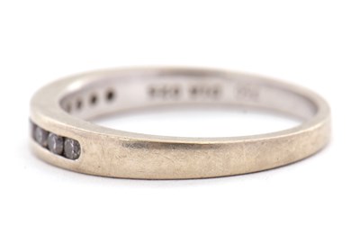 Lot 22 - An 18ct diamond half eternity ring, with...