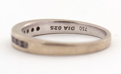 Lot 22 - An 18ct diamond half eternity ring, with...