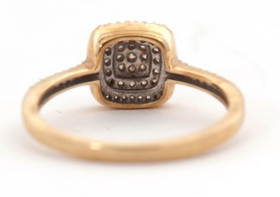 Lot 16 - A 9ct diamond cluster ring, with a central...