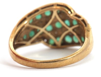 Lot 1 - A 9ct emerald and diamond ring, set with three...
