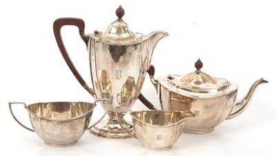 Lot 27 - An Art Deco four piece silver tea set of oval...